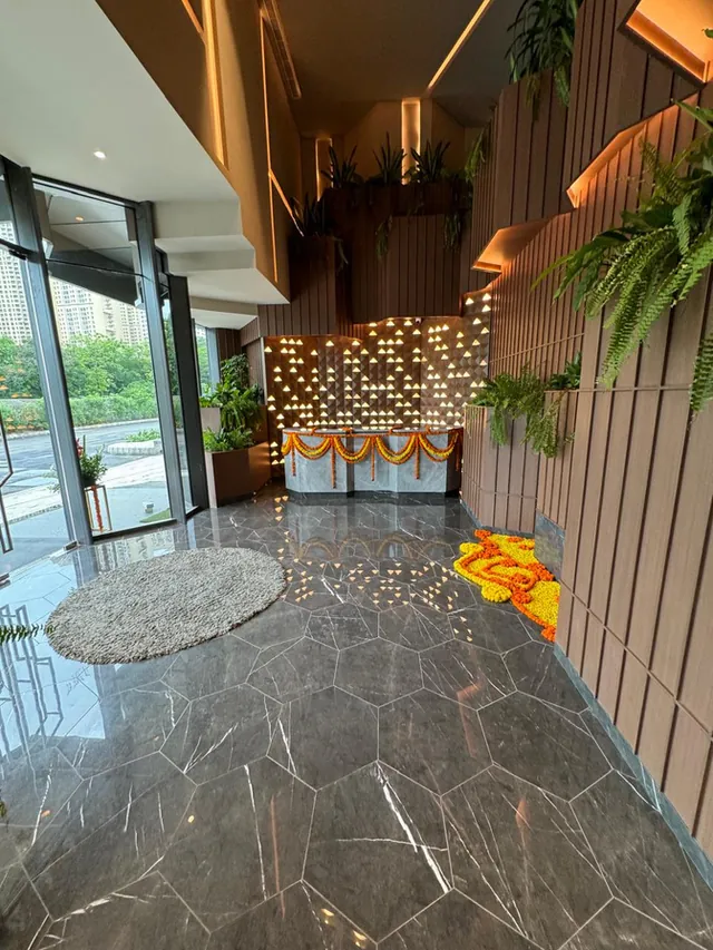 Reception space with floral lighting feature and glazed views
